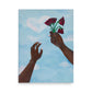 Art print of two hands holding wilting flowers towards the sky.