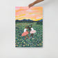 24x36 handheld art print of two ballerinas in a flower field with a colorful sky.