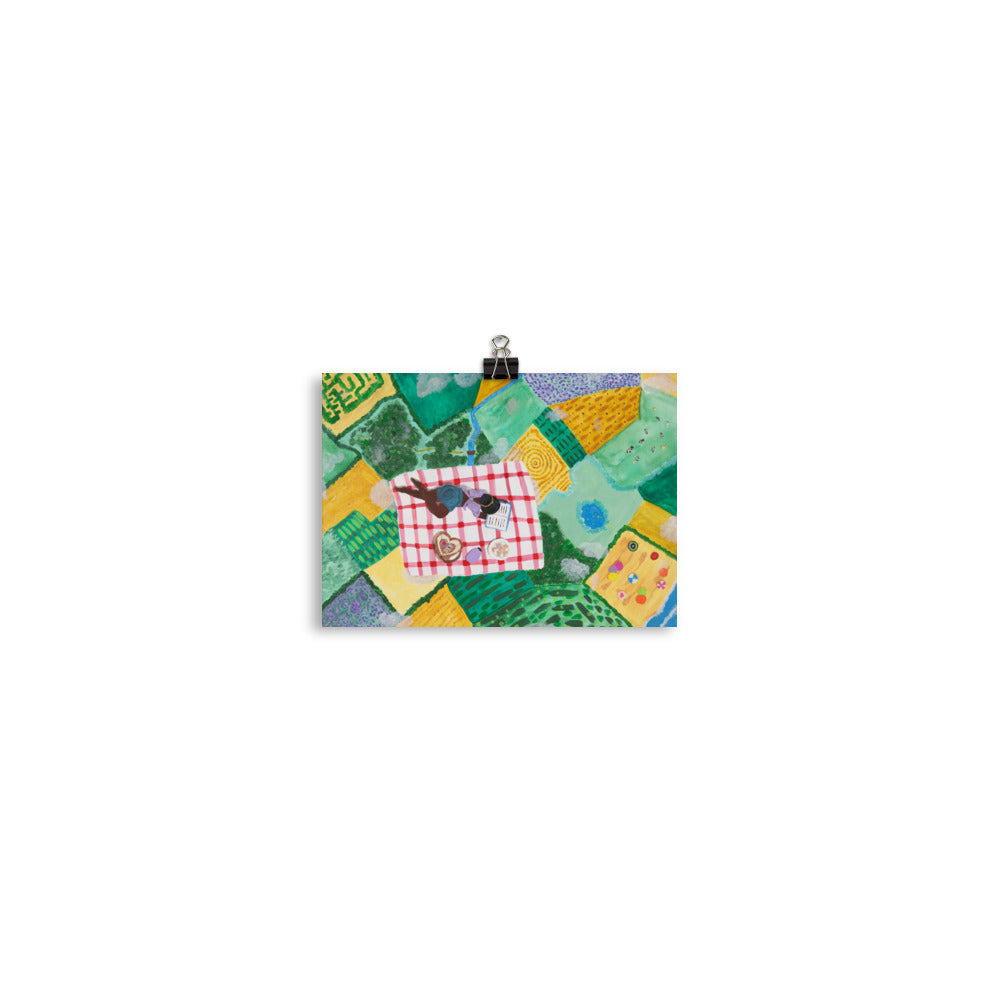 Art print of woman in clouds on a picnic blanket.